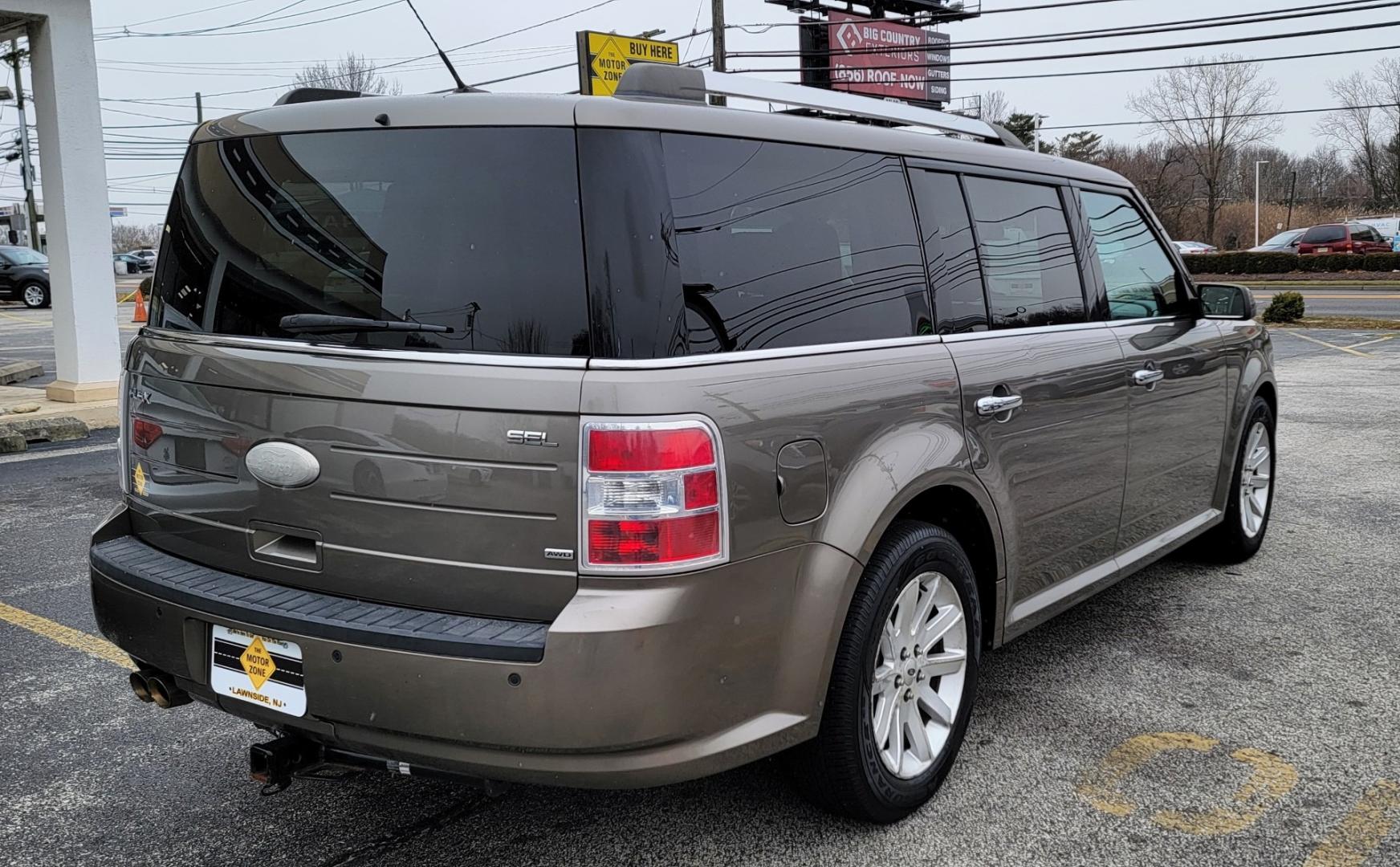 2012 Brown /Black Leather Ford Flex SEL AWD (2FMHK6CC6CB) with an 3.5L V6 DOHC 24V engine, 6-Speed Automatic Overdrive transmission, located at 341 N White Horse Pike, Lawnside, NJ, 08045, (856) 262-9500, 39.855621, -75.027451 - Photo#2